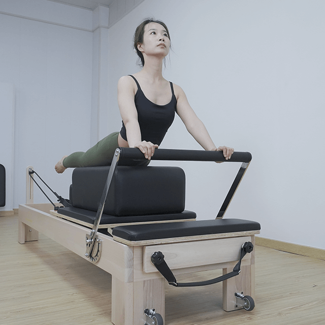 Buona qualit&agrave; Yoga Core Training Legno d'acero Classico Pilates Reformer Machine Pilates Reformers